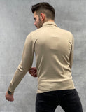 Col roulé beige